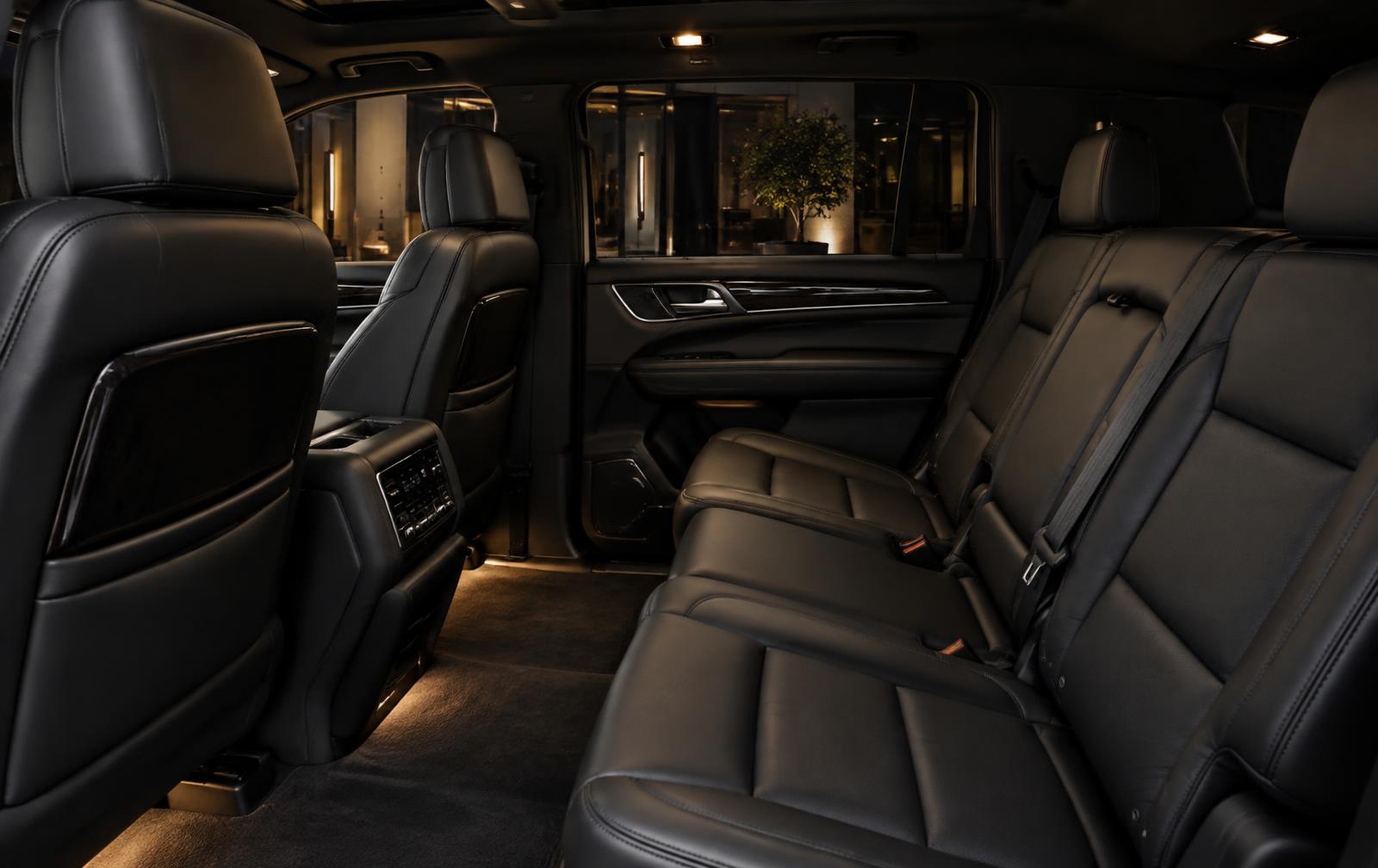 Rear passenger cabin of the black Cadillac Escalade